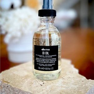 Davines Oi oil beautifying potion 135ml. Full size bottle. Brand new, unused.